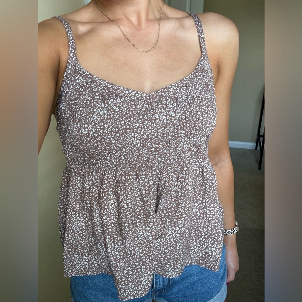 Brown and white dot tank